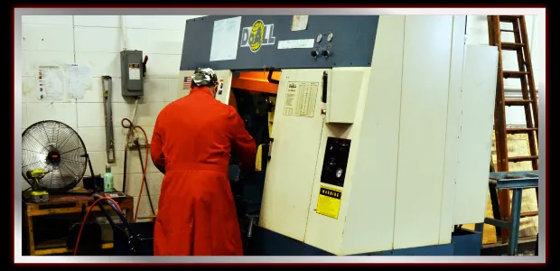 MIR operator at the vertical bandsaw