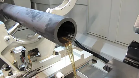 Cutting fluid discharging from a deep-drilled bore