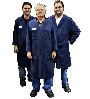 Three MIR Machining team members in navy shop coats